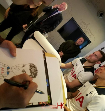 Artist drawing Dele Alli at an event