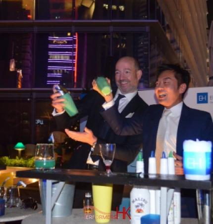 flair bartender interacting with guests