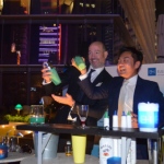 Guests enjoying some interaction with flair bartender