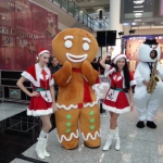 Gingerbread and snowman playing at event in Hong Kong