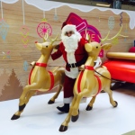 Santa Wayne with reindeers and sleight
