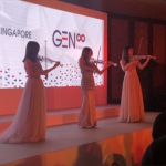 3 violinist using LED violins performance on stage