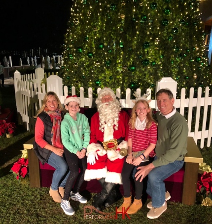 santa sitting with patrons