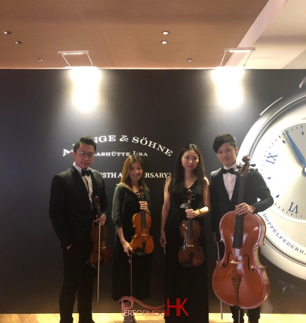 String players at watch maker event