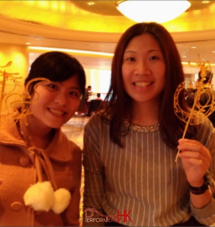 2 female event goer at hotel in hung hum hong kong for hsbc hk event with Sugar painting (糖画)