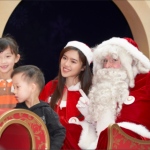 Santa Jay with a group of kids