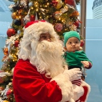 santa with elf baby