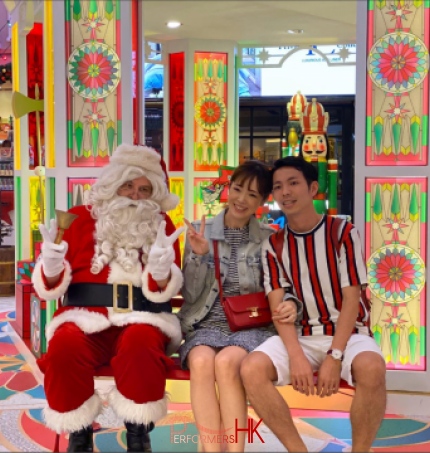 mira mall tst santa gerald with guests in shorts