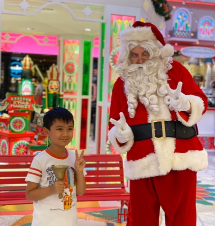youngster with santa in tst mira mall