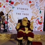 Santa Pete sitting at Peninsula Hotel ballroom