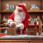 Hugh at Fortnum & mason packing hampers for Christmas deliveries