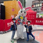 Kids at Dragon centre posing with Easter bunny for photo