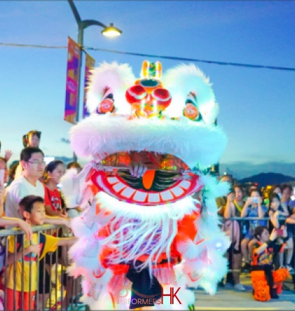 white color lion roving around venue at wan chai harbour chill area in Hong Kong for Hong Kong Tourism board event