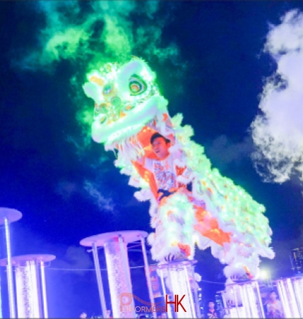 Our LED lion dancers bravely jumping on stilts at an event in Wan Chai harbour chill with the hong kong tourism board 2023