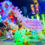 Beautiful duo led lion dancers ready to jump stilts