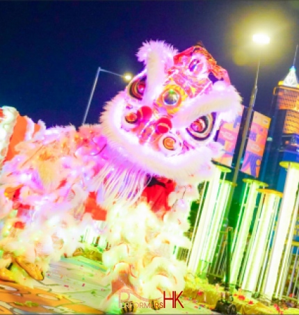 led lion dancers in red led shinning on floor before getting up on to stilts led performance hong kong