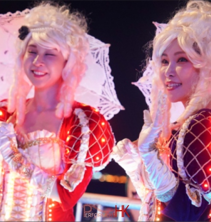 2 led custom made costume at a festival for hong kong tourism board one is red and the other is purple