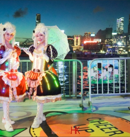 two girls in led costume custom made by performers hk hired by hong kong tourism board for the harbour chill festival