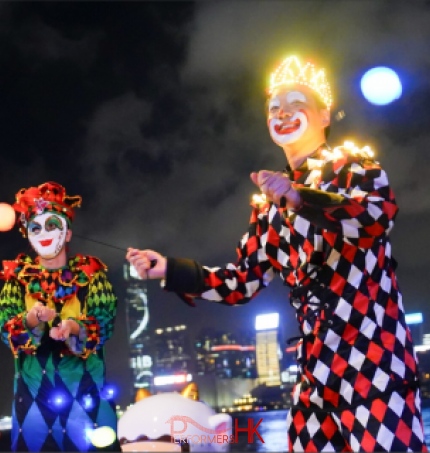 stilt walker with venetian stilts costume juggling led poi 