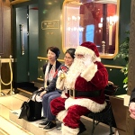 Santa Pete sitting with guests at Peninsula hotel during Dec 2022