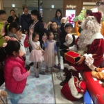 Mario doing his magic tricks for kids at an event in HK