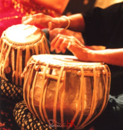 Traditional ethnic instrument player in Hong Kong playing Tabla at a corporate event