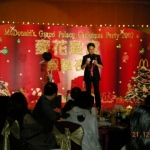 Andy doing a stage magic show for Mcdonalds Grand Palace Christmas party.